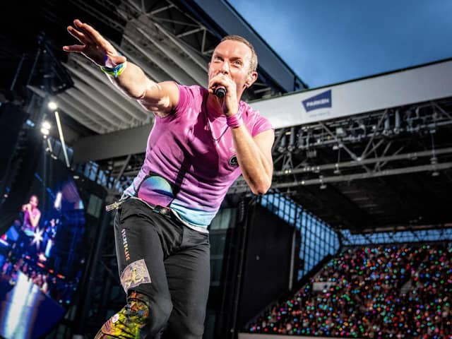 Coldplay performs at Parken Stadium in Copenhagen. Photo by Mads Claus Rasmussen / Ritzau Scanpix / AFP via Getty Images