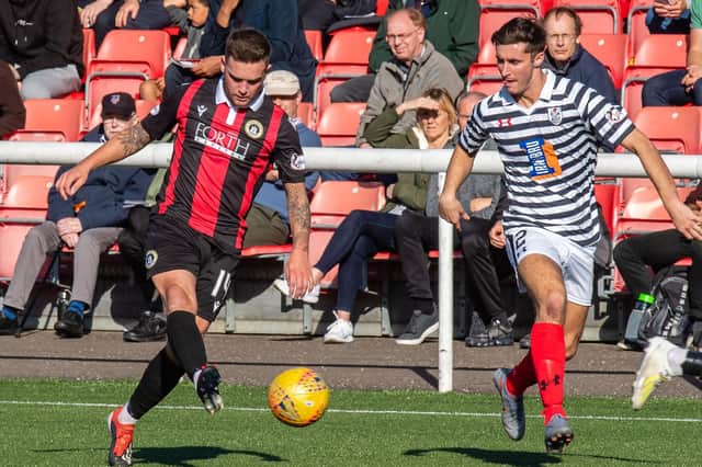 New Clyde signing Billy Mortimer (right) in action for Queen's Park