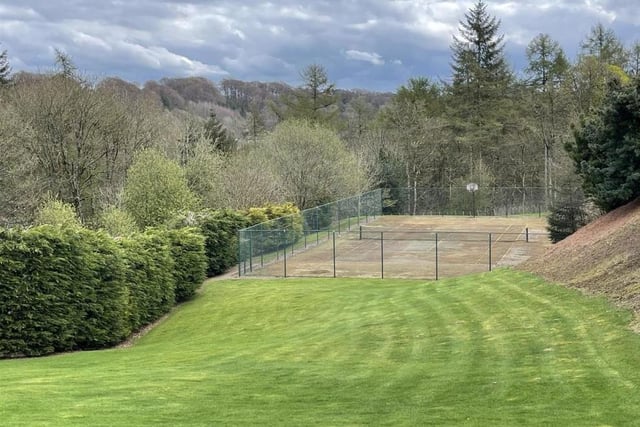 The private gardens are beautifully kept with rolling lawns and several patios to enjoy the views - not to mention your own tennis courts!