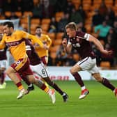 'Well striker Tony Watt sprinting clear