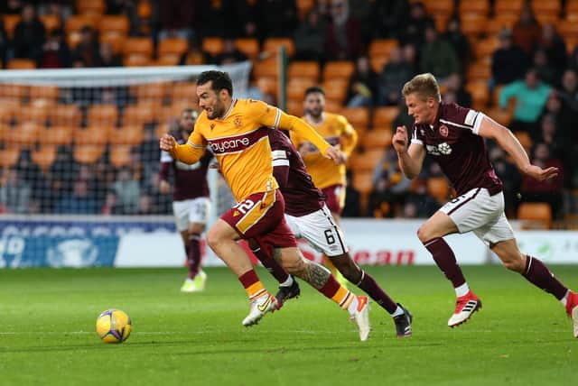 'Well striker Tony Watt sprinting clear