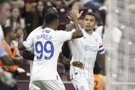 Rangers' James Tavernier, right, celebrates scoring a priceless goal against Servette.