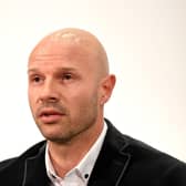 Danny Mills thinks the government or Scottish FA should intervene in the Old Firm supporters row.  