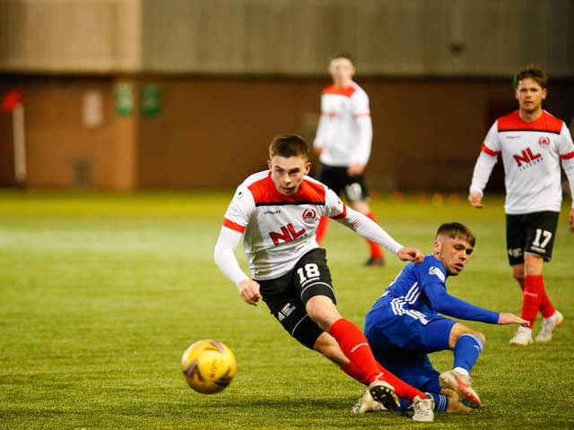 Cyde's Jack Thomson, on loan from Rangers, gets away from Connor Smith of Cove Rangers