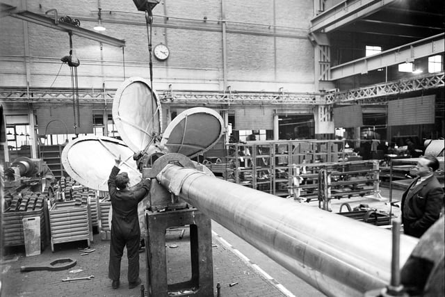 A view of the interior of the Yarrow Shipyard at Scotstoun in Glasgow showing a propellor being fitted to a shaft