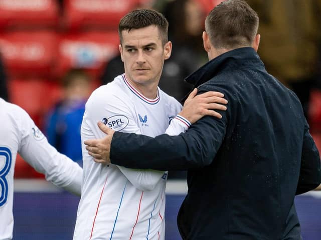 Rangers' Tom Lawrence is acknowledged by manager Michael Beale after his first competitive outing in a year, which came with his 73rd minute introduction as substitute  as the Ibrox men secured a  2-0 win over Ross County at Dingwall.(Photo by Mark Scates / SNS Group)