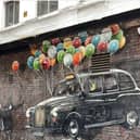 The World’s Most Economical Taxi – Painted by Rogue Oner, located on Mitchell Street