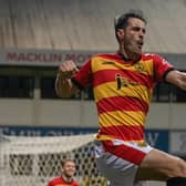 Brian Graham celebrates his late winner for Partick Thistle against Queen's Park.