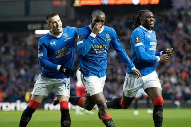 Rangers' Glen Kamara (centre) kisses the black armband in memory of kitman Jimmy Bell, who passed away suddenly this week, after scoring to make it 2-0 over RB Leipzig in the Europa League semi-final second leg at Ibrox. (Photo by Craig Williamson / SNS Group)