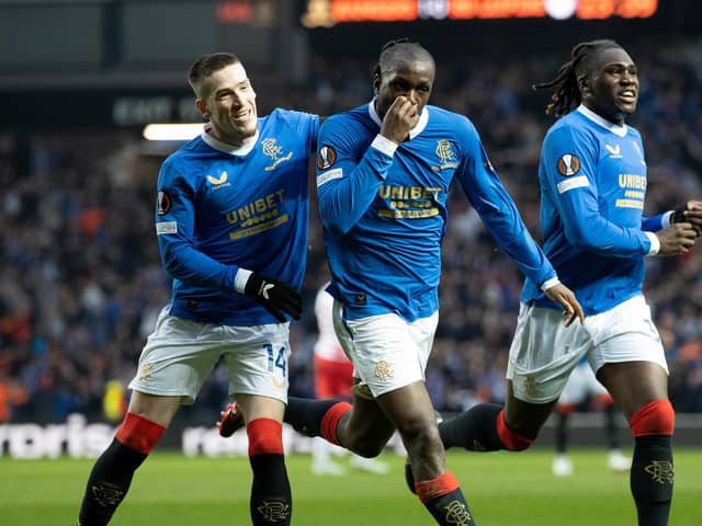 Rangers' Glen Kamara (centre) kisses the black armband in memory of kitman Jimmy Bell, who passed away suddenly this week, after scoring to make it 2-0 over RB Leipzig in the Europa League semi-final second leg at Ibrox. (Photo by Craig Williamson / SNS Group)