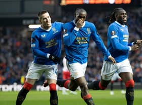 Rangers' Glen Kamara (centre) kisses the black armband in memory of kitman Jimmy Bell, who passed away suddenly this week, after scoring to make it 2-0 over RB Leipzig in the Europa League semi-final second leg at Ibrox. (Photo by Craig Williamson / SNS Group)