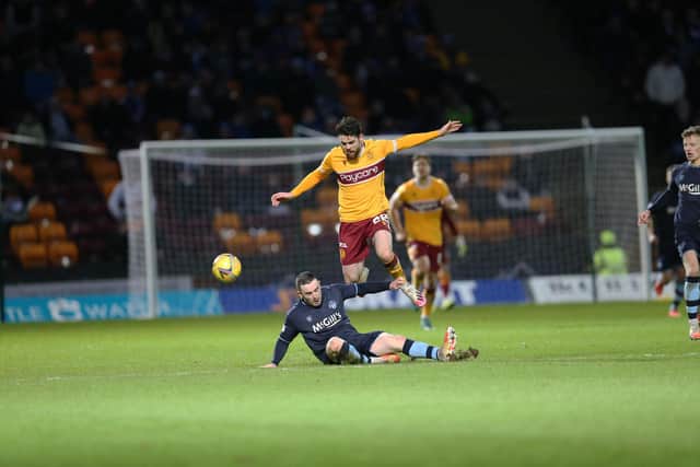Matchwinner Liam Donnelly hurdles a tackle