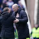 Rangers manager Philippe Clement (right) embraces Celtic manager Brendan Rodgers following the cinch Premiership match at Ibrox Stadium. 