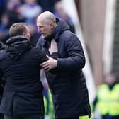 Rangers manager Philippe Clement (right) embraces Celtic manager Brendan Rodgers following the cinch Premiership match at Ibrox Stadium. 