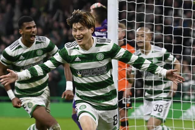 Celtic's Kyogo Furuhashi celebrates after striking in the 90th minute in the 4-2 win over Dundee United. (Photo by Rob Casey / SNS Group)