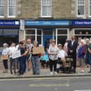 People came out in force all along the route last year to show their support for the service, pictured here at a protect in Biggar.