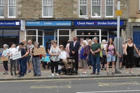 People came out in force all along the route last year to show their support for the service, pictured here at a protect in Biggar.