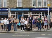 People came out in force all along the route last year to show their support for the service, pictured here at a protect in Biggar.