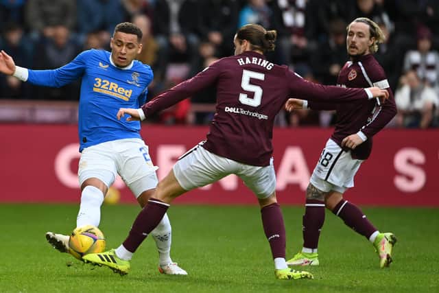 Peter Haring challenges Rangers' James Tavernier during Hearts' 2-0 defeat at Tynecastle. Picture: SNS
