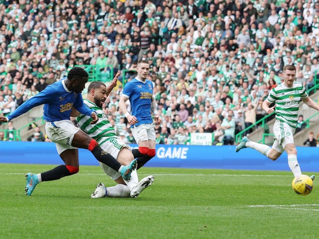 Fashion Sakala evades Cameron Carter-Vickers but his shot hits the post.