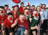 2007 - High School Year Seven pupils at the start of their Red Nose Day fun run, organised by the School Council. 