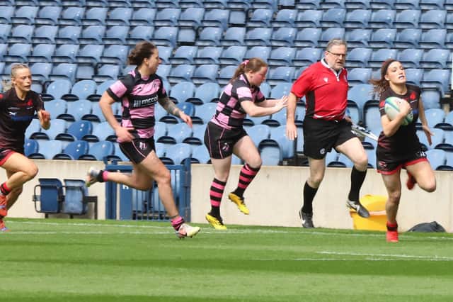 Gerry Kimm sprinting past the Ayr defence on the way to her third try
