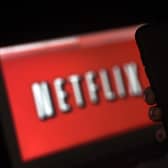 Netflix begins crackdown Photo: Olivier Douliery/AFP via Getty Images.