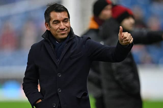 Rangers' Dutch manager Giovanni van Bronckhorst makes a thumbs up gesture to the fans ahead of the UEFA Europa League Group A football match between Rangers and Sparta Prague at the Ibrox Stadium in Glasgow on November 25, 2021. (Photo by Paul ELLIS / POOL / AFP) (Photo by PAUL ELLIS/POOL/AFP via Getty Images)