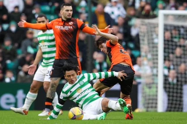 Celtic's Reo Hatate (L) and Dundee United's Ian Harkes during a cinch Premiership match between Celtic and Dundee United at Celtic Park, on January 29, 2022, in Glasgow, Scotland.  (Photo by Alan Harvey / SNS Group)