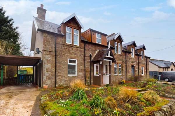 This four-bedroom, traditional semi-detached home in Roberton is as beautiful on the outside as it is inside.