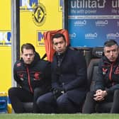 Rangers manager Giovanni Van Bronckhorst (centre), already has Dave Vos (left) and Roy MaKaay on his coaching staff an has now added Ceri Bowley. (Photo by Rob Casey / SNS Group)