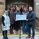 David Archer, MD of Sephra Europe (far right) together with Cathryn (Davids’s wife) and Faith (Davids’s daughter) presenting the cheque to representatives from Perth Autism Support.