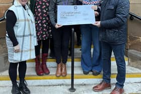 David Archer, MD of Sephra Europe (far right) together with Cathryn (Davids’s wife) and Faith (Davids’s daughter) presenting the cheque to representatives from Perth Autism Support.