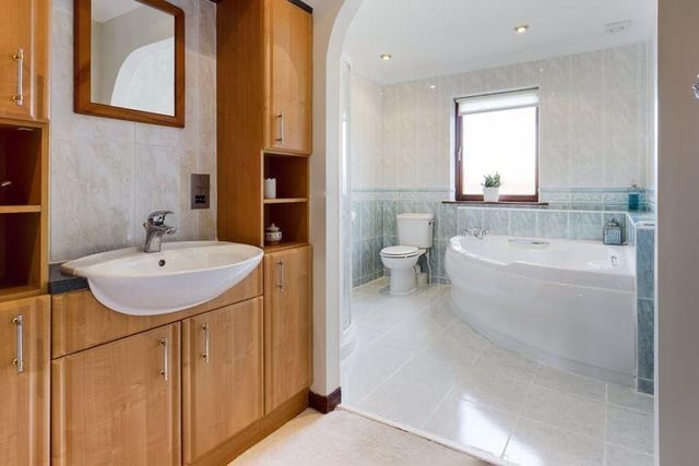 A large family bathroom, with dressing area, a jacuzzi corner bath and shower cubicle completes the downstairs ‘wing’.