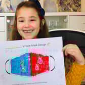 Sophia with her face mask design for the Medicspot Face Mask Challenge.