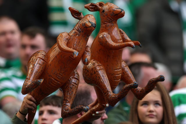 Celtic fans wave inflatable kangaroos before the game.