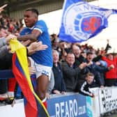 Alfredo Morelos leaps into the visiting support to celebrate his 100th goal for Rangers in their 2-1 win over St Mirren on Sunday. (Photo by Craig Williamson / SNS Group)