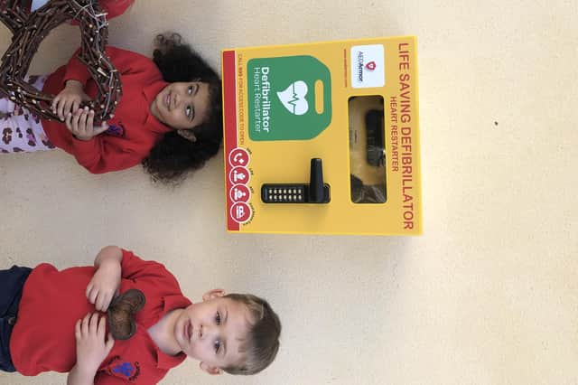 The youngsters are delighted that help is now available within  the community should there be an emergency