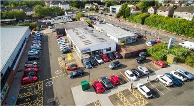 The site earmarked for development on Milngavie Road - currently home to an Arnold Clark dealership