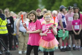 VIP starter Freya Pennington (right) with her sister Eliza at Race for Life 2022, Glasgow. Pic: Mark Anderson