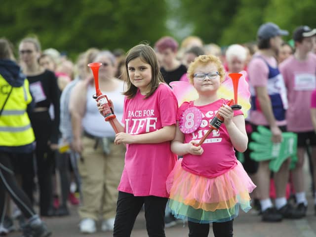 VIP starter Freya Pennington (right) with her sister Eliza at Race for Life 2022, Glasgow. Pic: Mark Anderson