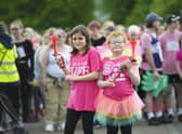 VIP starter Freya Pennington (right) with her sister Eliza at Race for Life 2022, Glasgow. Pic: Mark Anderson