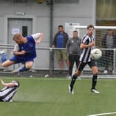 Carluke Rovers Jonny Wilson is fouled during the 3-1 defeat at Port Glasgow Juniors (Pic by Kevin Ramage)