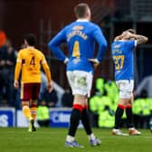 Rangers midfielder Scott Arfield holds his head in despair at full-time after the Scottish champions dropped two points in a 2-2 draw against Motherwell at Ibrox. (Photo by Craig Williamson / SNS Group)