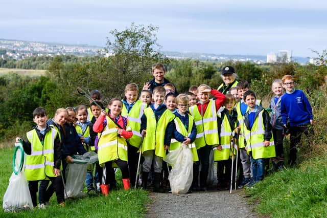 P3/4 pupils from Knowetop Primary take part in a litter pick at Baron's Haugh Nature Reserve hosted by Asda Motherwell community champion Bernadette Hart and RSPB assistant warden Sam Udale-Smith
