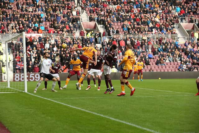 Juhani Ojala forces save from home keeper Craig Gordon