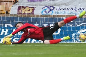 Liam Kelly made some fine saves like this when on loan for Motherwell last season (Pic by Ian McFadyen)