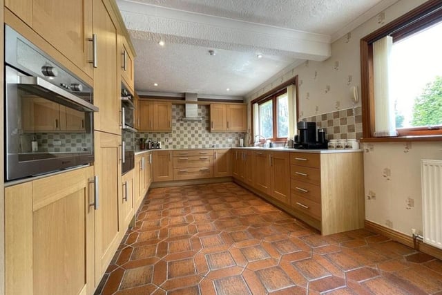 The dining kitchen is beautifully kitted out; there is also a handy utility room to keep the laundry out of sight, if not mind, and an additional wc.