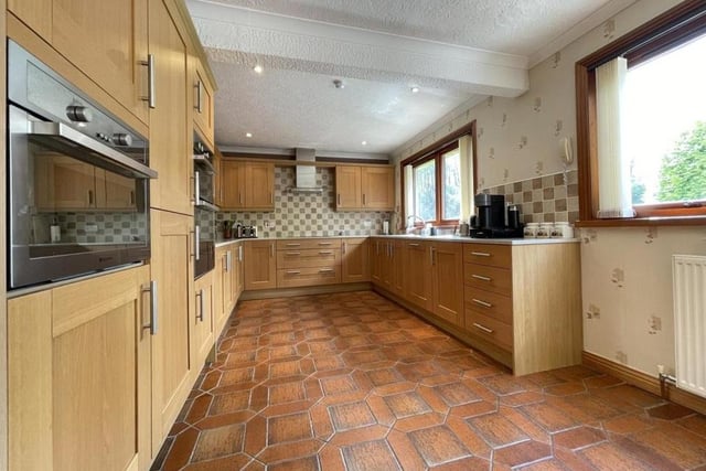 The dining kitchen is beautifully kitted out; there is also a handy utility room to keep the laundry out of sight, if not mind, and an additional wc.
