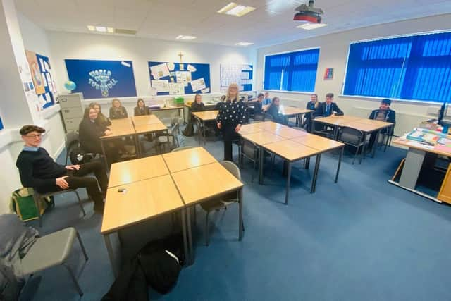 Pupils pose questions to Amy Callaghan during her visit to the school.